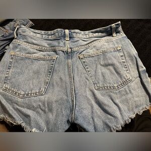 TopShop light washed distressed jean short. Size 8.